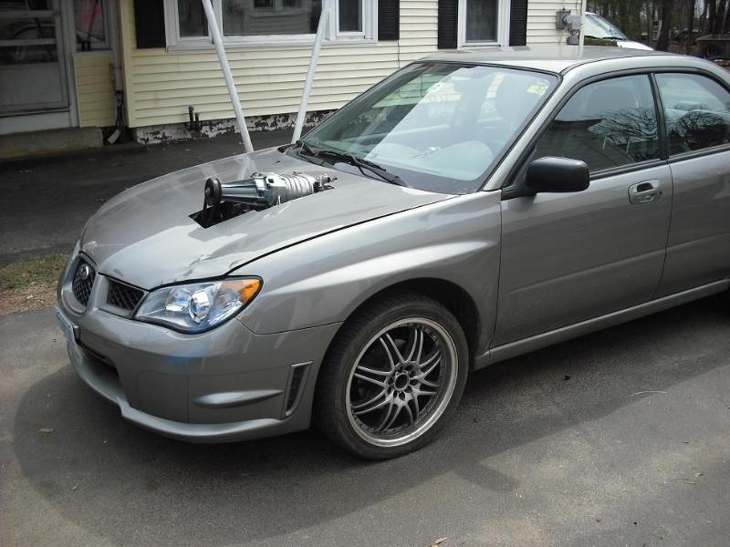 Illustration for article titled Garage Mechanic Ghetto-Rigs Subaru Impreza With Eaton Supercharger